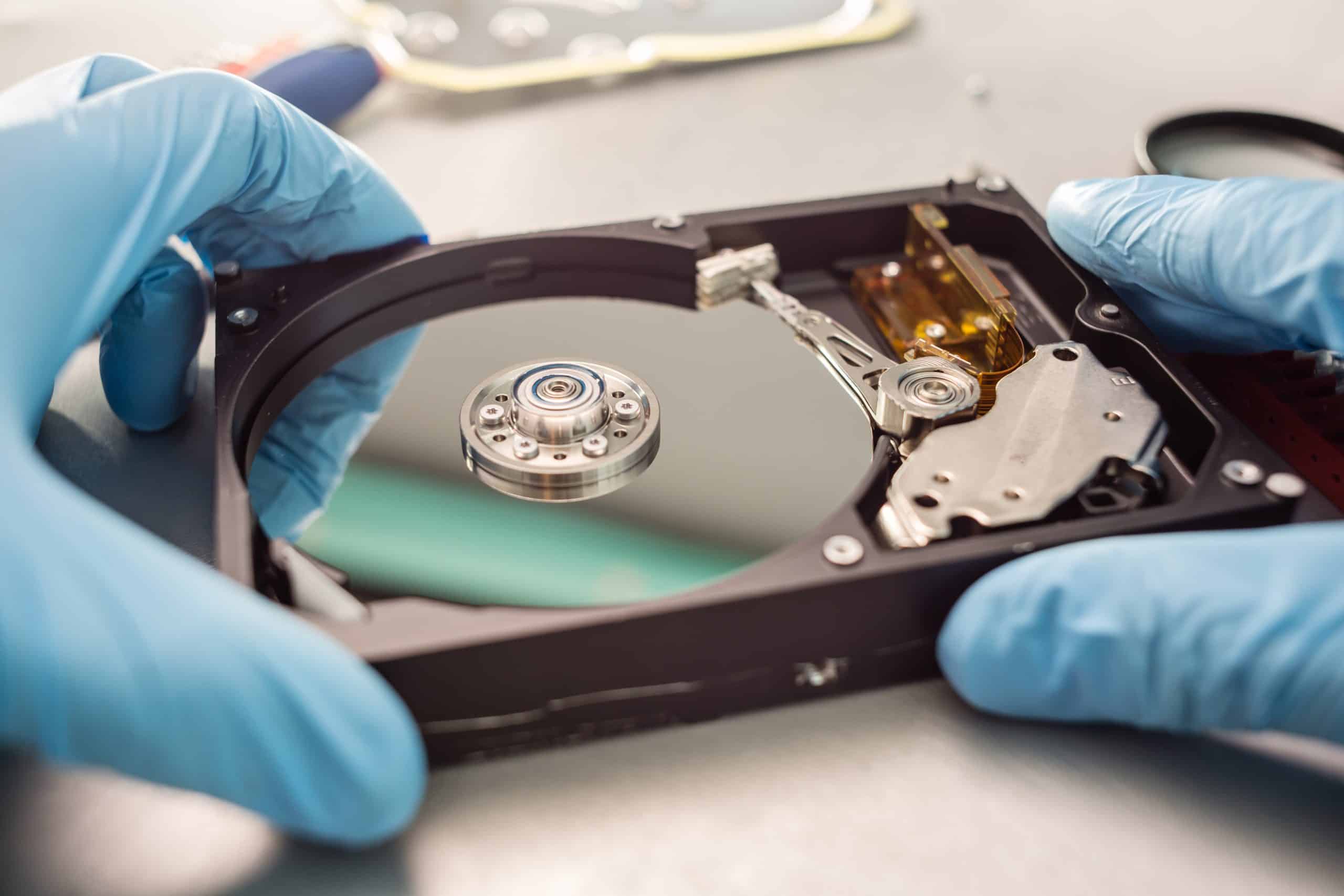 Hard drive being repaired for data recovery in Denver.