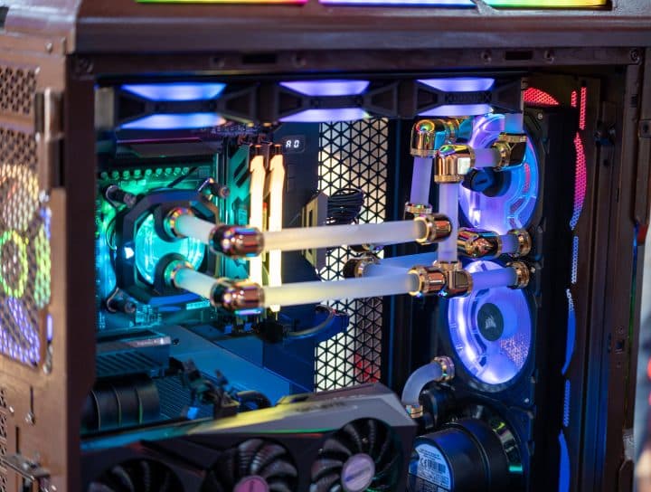 Custom-built PC featuring advanced water cooling and RGB lighting for optimized performance.