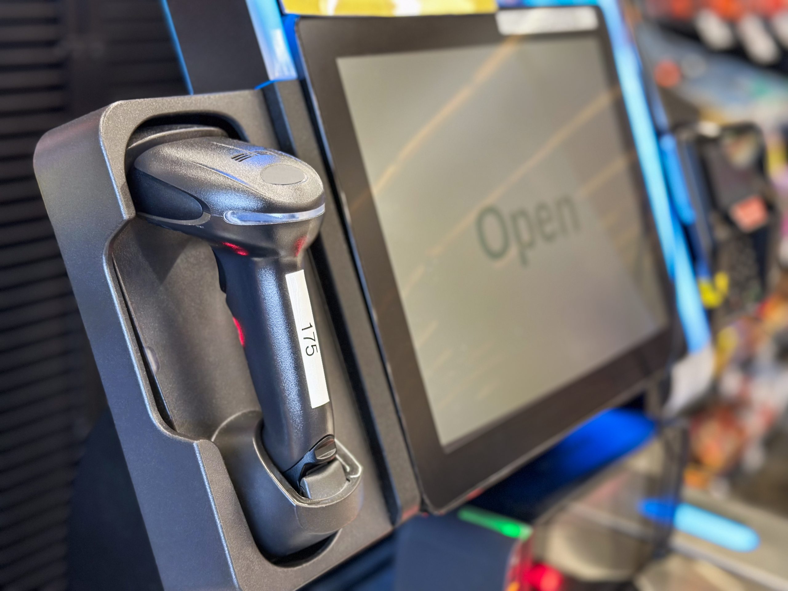 POS Barcode Scanner and Terminal Setup in Denver Close-up of a barcode scanner and POS terminal in a retail store in Denver Metro.